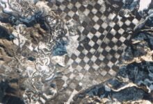 A satellite photo of a chessboard -like pattern in a forest in Idaho