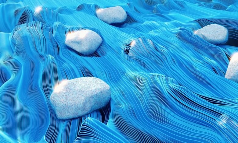 قام علماء الرياضيات بحل مشكلة عمرها 125 عامًا، من خلال توحيد ثلاث نظريات في الفيزياء 1 an illustration of fluid blue lines floating over rocks