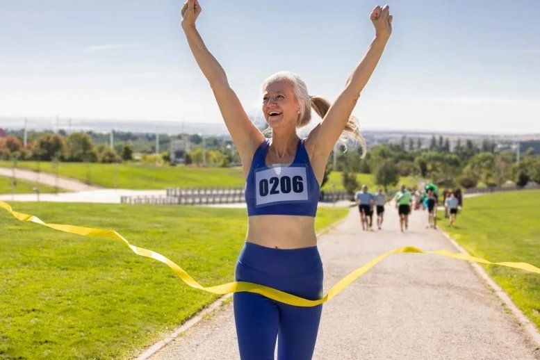 Senior Woman Marathon Runner Winning Race