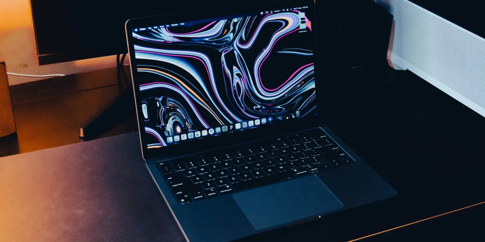1768827822 210 macbook pro unsplash wallpaper