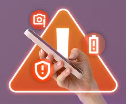 a hand holding a phone with camera security and battery icons around it with a warning sign