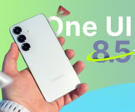 a hand holding a samsung galaxy s25 with one ui 8 5 displayed beside it