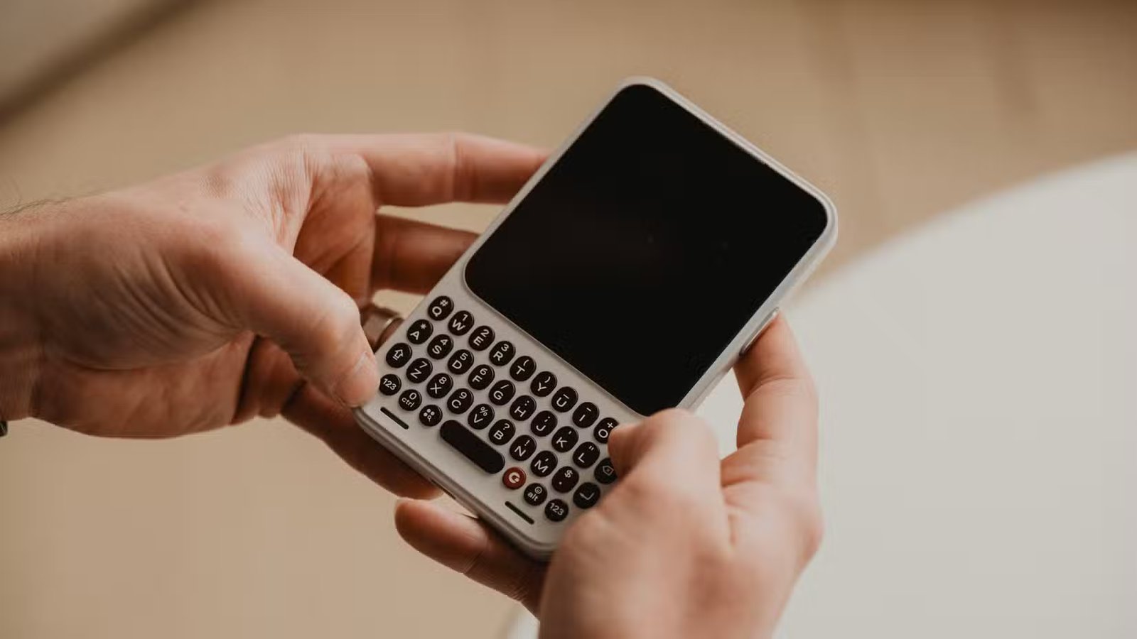 clicks communicator hand