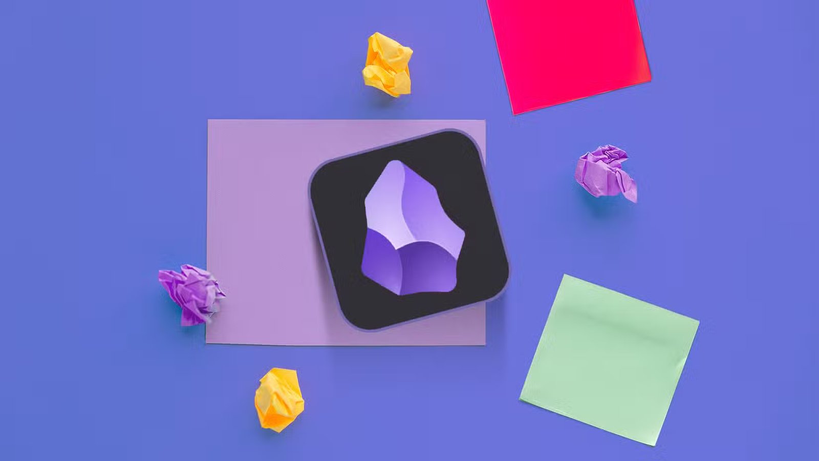obsidian app logo on a sticky note surrounded by crumpled paper balls and colorful notes
