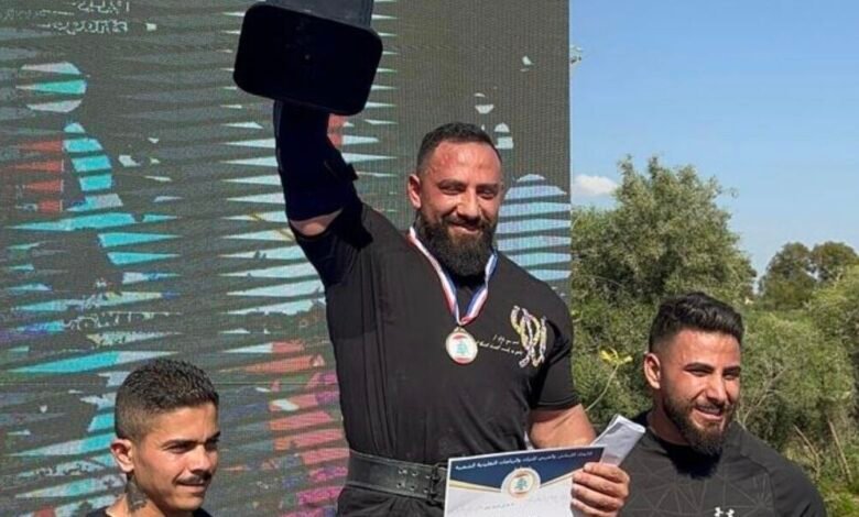 إنجاز لبناني عالمي.. علي صفي الدين يحطم الرقم القياسي العالمي في رفع الجرن بوزن 100 كلغ